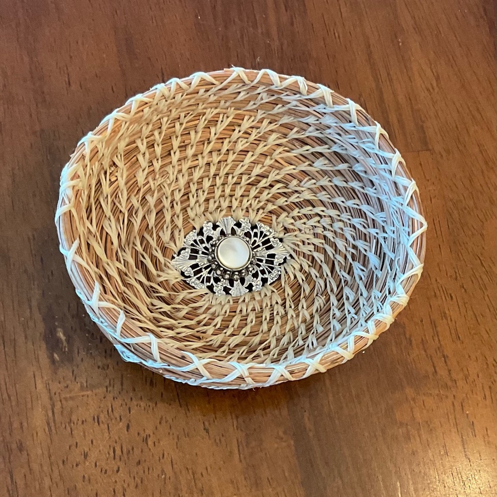 Pine needle basket with upcycled brooch bottom